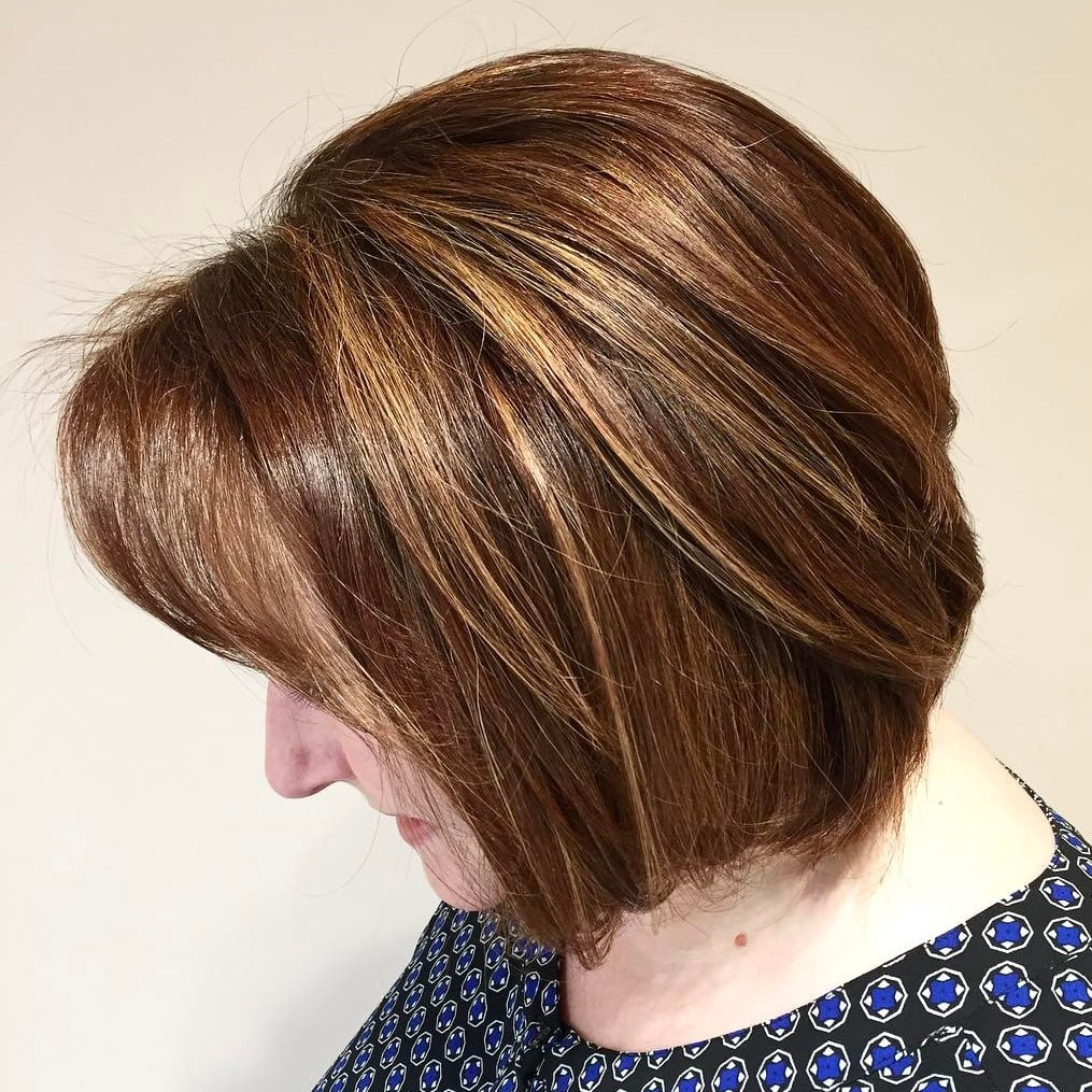 Sleek Auburn Bob with Blonde Highlights